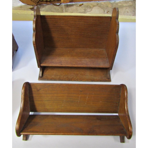 214 - A collection of seven small vintage book troughs, principally in oak, together with a set of Wedo ci... 