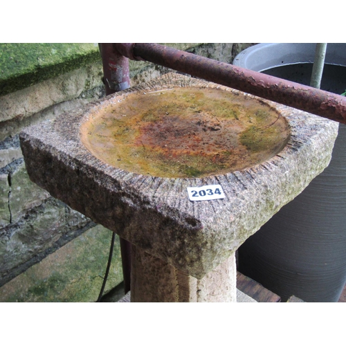 2034 - A weathered cast composition rough hewn style two sectional stone garden bird bath, with square dish... 