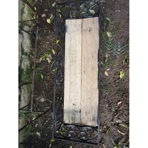 2041 - A free standing steel planter with open scrollwork detail, 66cm wide x 22cm deep x 73cm high, togeth... 