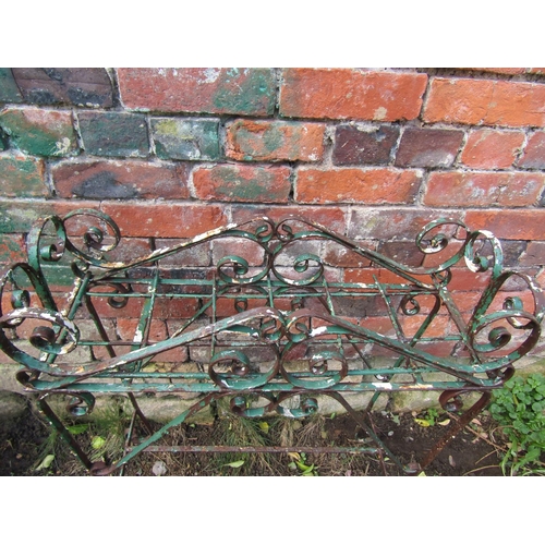 2041 - A free standing steel planter with open scrollwork detail, 66cm wide x 22cm deep x 73cm high, togeth... 