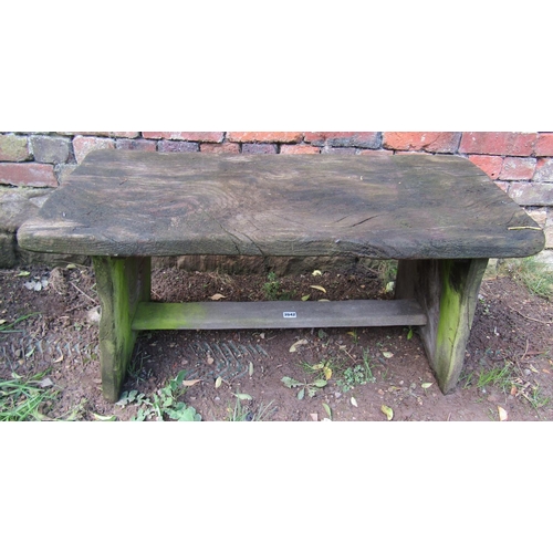 2042 - A rustic weathered oak or possibly elm occasional table with pegged stretcher, 91cm long x 42cm wide... 