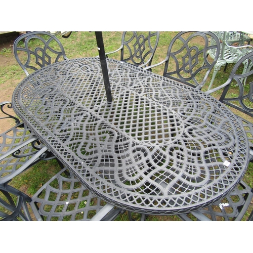 2050 - A mat painted cast alloy D end garden terrace table with decorative pierced top, together with a set... 