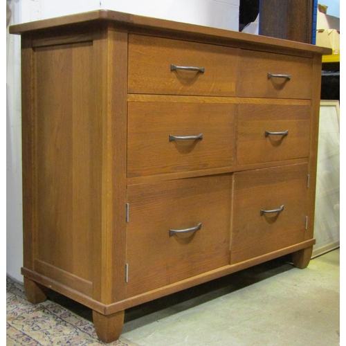 2104 - A good quality contemporary medium oak dresser, the front elevation fitted with an arrangement of fo... 