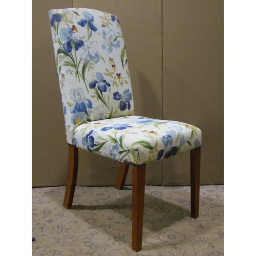 2123 - Set of eight dining chairs with floral patterned upholstered seats and backs, raised on simple squar... 