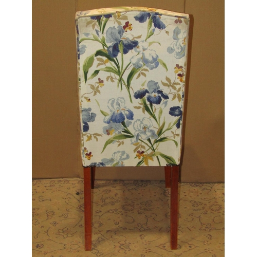 2123 - Set of eight dining chairs with floral patterned upholstered seats and backs, raised on simple squar... 