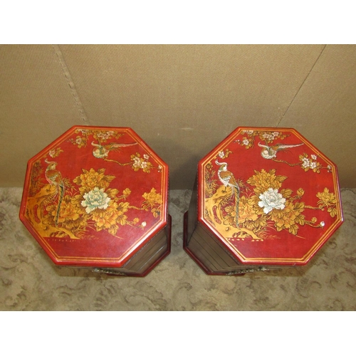 2206 - Pair of contemporary Chinese five drawer pedestal chests of octagonal form, with crimson finish and ... 