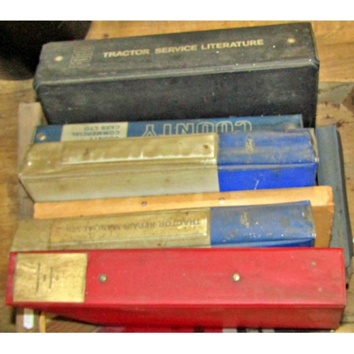 220 - Two boxes to include showroom manual and training manuals for vintage agricultural equipment from 19... 