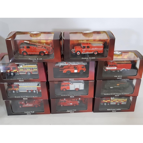 370 - Collection of model vehicles including 11 boxed fire engines and 11 1:76 scale die cast model buses ... 