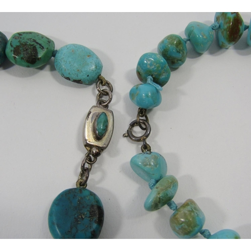 1332 - Two heavy turquoise bead necklaces, each with silver clasp