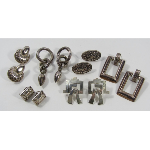 1336 - Varied collection of silver earrings to include three pairs with embossed decoration, three pairs of... 