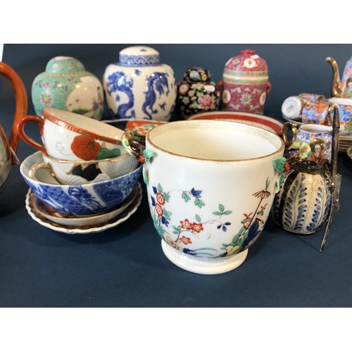 1047A - A Large Collection of Chinese and Japanese Items (mostly porcelain) including: four ginger jars with... 