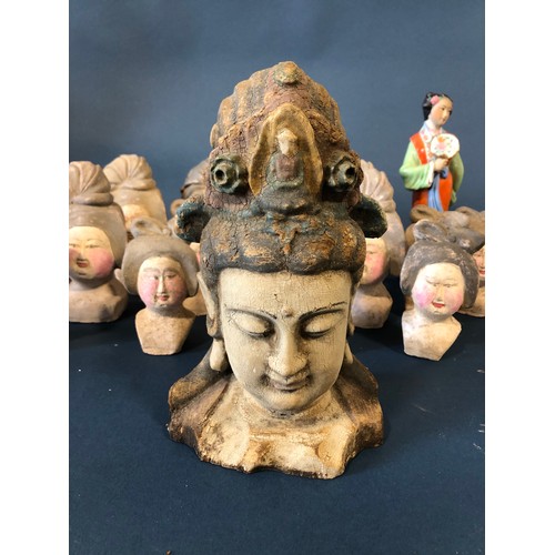 1048A - Nineteen Chinese Figurative Items: Seventeen Tang type court lady heads, a carved and polychrome pai... 