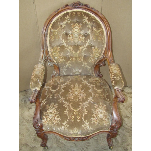 2293 - A Victorian spoon back drawing room chair with repeating floral upholstered seat and buttoned back, ... 