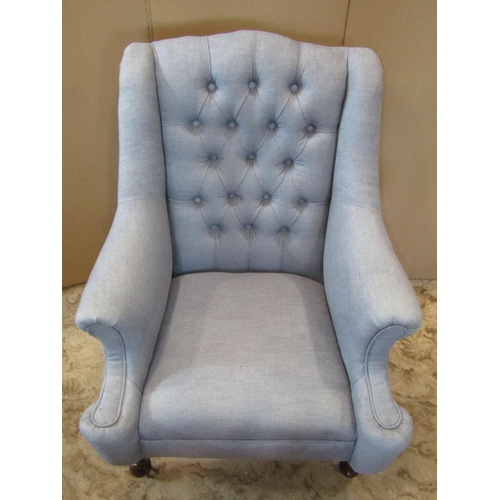 2296 - An Edwardian drawing room chair, with shaped outline, swept and rolled arms, pale blue upholstered w... 