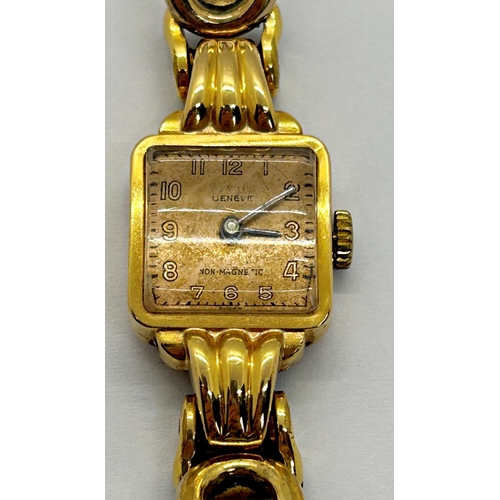 1361 - A ladies dress watch with 18k casework, square dial, and gold plated strap