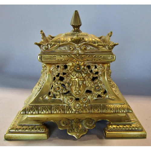 1456 - An impressive brass Empire ink well with mask and floral detail to the square swept base, together w... 