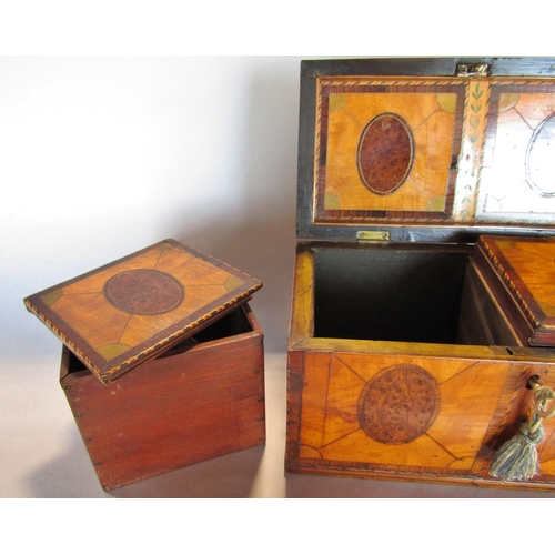 1473 - An 18th century satinwood tea caddy, with oval burr walnut panels with rosewood banding , cross stru... 