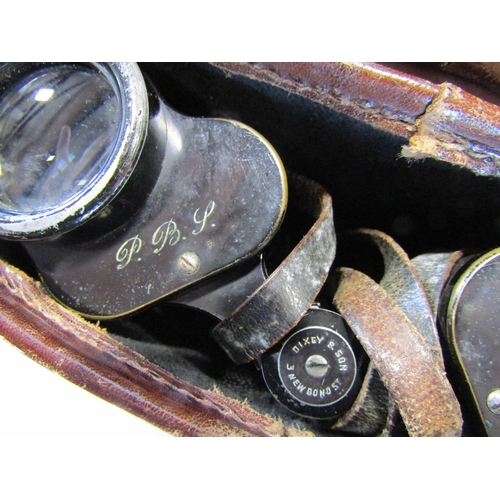 1489 - Three pairs of vintage binoculars in their original leather cases, together with Africa Star 39-45 w... 