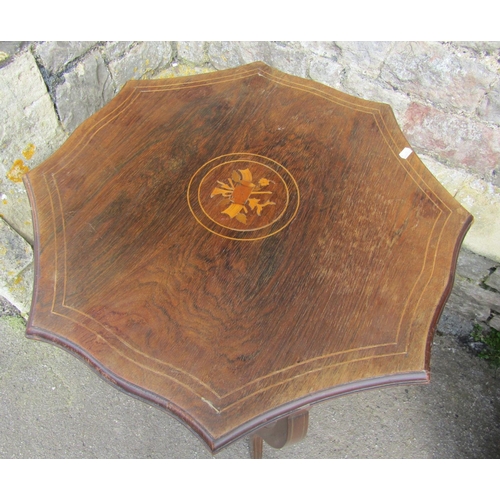 2387 - An inlaid Edwardian rosewood two tier occasional table, the octagonal top with shaped and moulded ou... 