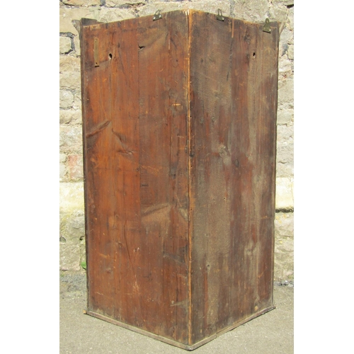 2391 - A Georgian oak hanging corner cupboard enclosed by a rectangular moulded and crossbanded rectangular... 