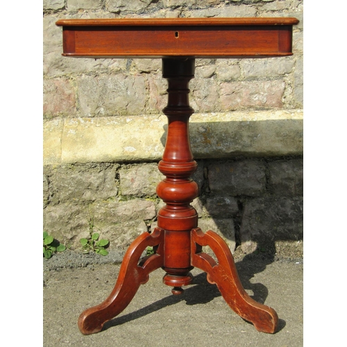 2397 - A Victorian mixed wood occasional table the shallow rectangular box hinged lid raised on a turned pi... 