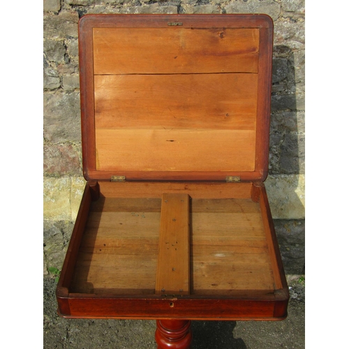 2397 - A Victorian mixed wood occasional table the shallow rectangular box hinged lid raised on a turned pi... 