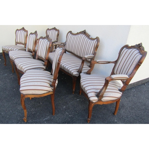 2413 - A seven piece salon suite comprising sofa, two armchairs, four singles chairs, all with carved and m... 