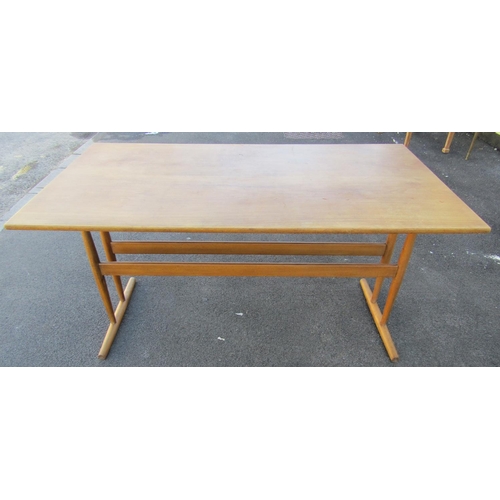 2419 - A mid-20th century beechwood refectory table of simple construction the plank top raised on turned s... 