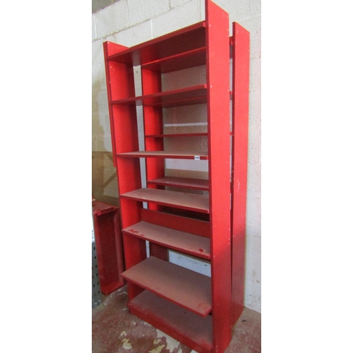 2420 - Two painted bookcases of full height with fitted shelves, together with a further smaller example