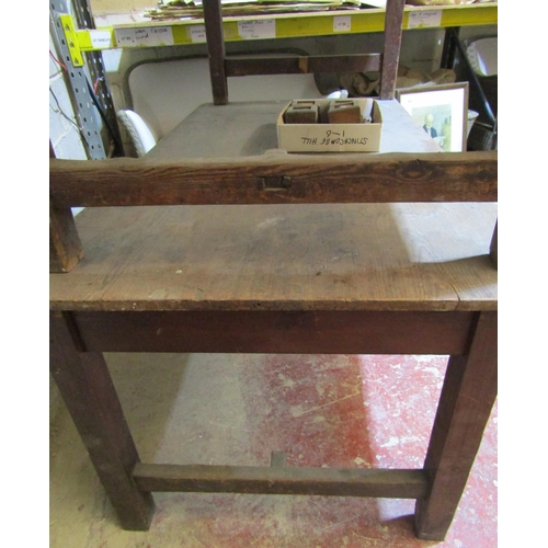 2427 - A pair of 19th century pine kitchen tables, each with plank tops raised on square cut supports enclo... 