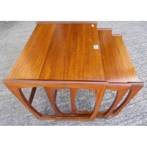 2429 - A nest of three G-Plan teak wood tables, 53cm wide and smaller