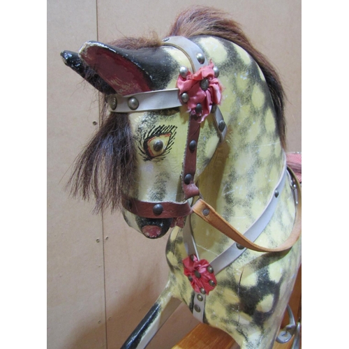 2436 - A vintage dapple grey rocking horse with harness, 115cm long max, 103cm high