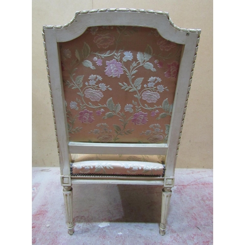 2437 - A French open armchair, the carved frame with acanthus and other detail, raised on fluted supports, ... 