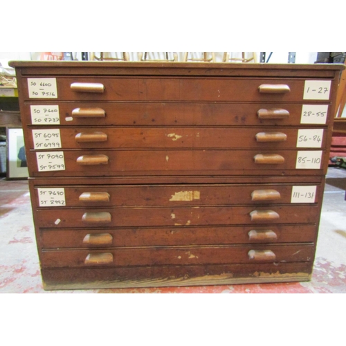 2438 - A George V pine plan or folio chest in two sections, with eight drawers on a plinth base