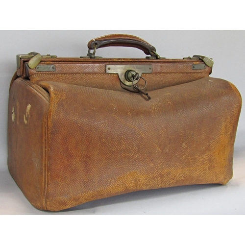 1535 - A vintage leather Gladstone bag with decent stitching and a large vintage Pukka suitcase.