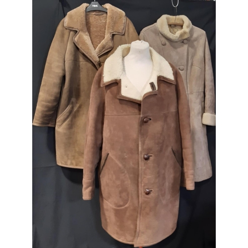 1570 - 3 sheepskin coats comprising womens coats by Morlands size 38 and by European High Fashion (no size ... 