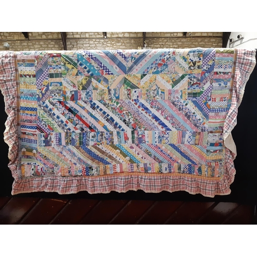 1573 - Cottage style patchwork quilt with numerous log shaped fabric patches, machine stitched with gingham... 