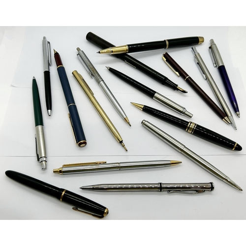 1391 - A collection of miscellaneous Parker and other ballpoint pens, number of military buttons, small col... 