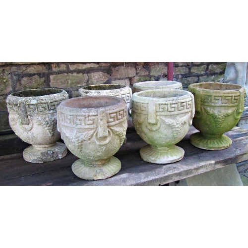 2011 - A run of six small weathered cast composition stone garden urns with classical Greek key, fixed ring... 