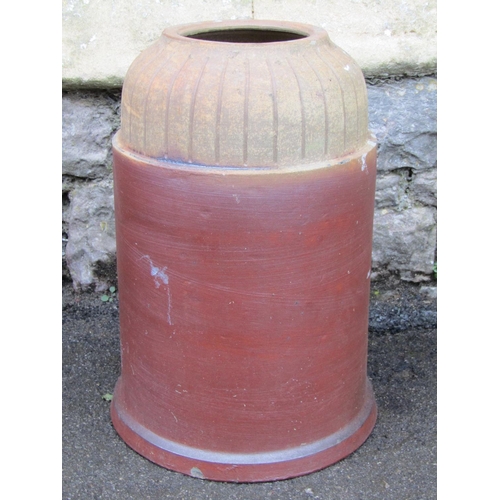 2065 - A partial mat glazed terracotta forcing pot, 45cm high