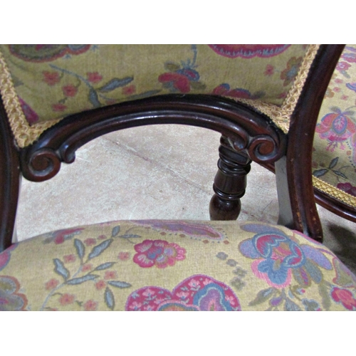 2155 - Set of four Victorian mahogany balloon back dining chairs with floral pattern upholstered seats and ... 