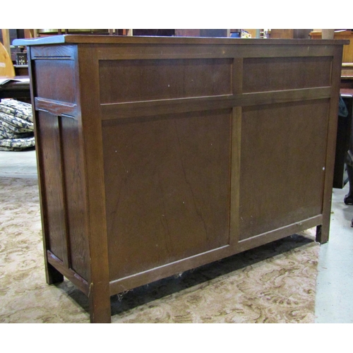 2178 - Good quality reproduction old English style oak dresser base enclosed by a pair of panelled doors be... 