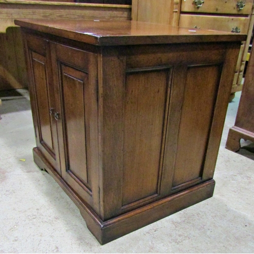 2188 - Good quality reproduction Georgian style low oak side cupboard enclosed by a pair of rectangular fie... 