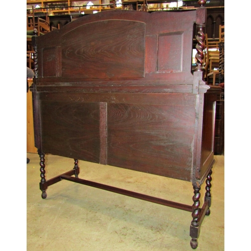 2194 - 1920s Jacobean revival oak mirror backed sideboard, with applied fretwork and further split moulding... 