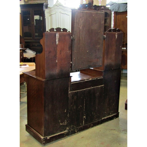 2221 - Edwardian walnut bedroom pair comprising a triple compactum wardrobe enclosed by an arrangement of c... 