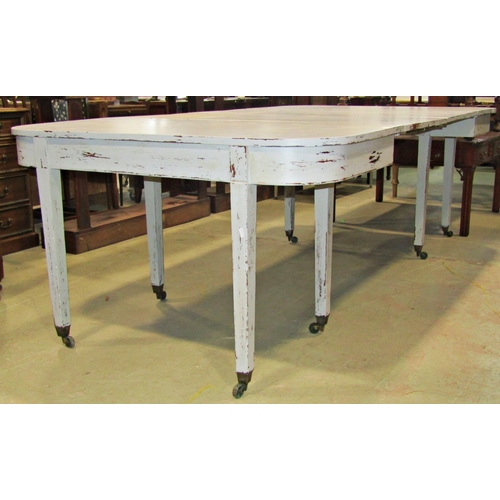 2231 - A Georgian D end sectional dining table with later painted finish, with two additional leaves, raise... 