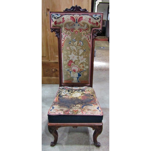 2240 - A Victorian rose wood predu, with floral tapestry upholstered seat and T shaped back within a show w... 