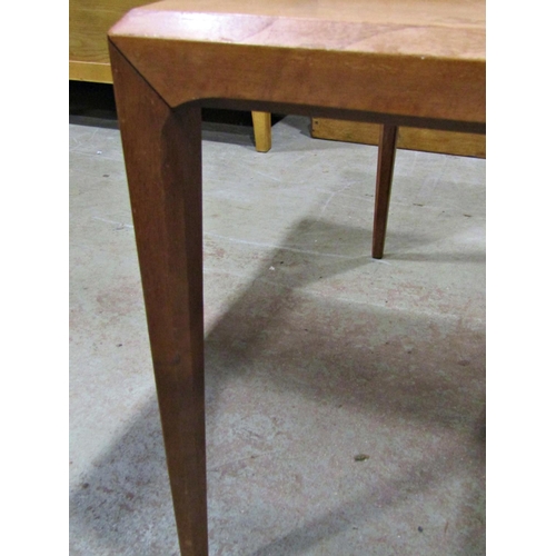 2246 - A mid-20th century teak occasional table of square cut and chamfered form, 76cm square x 53cm high (... 