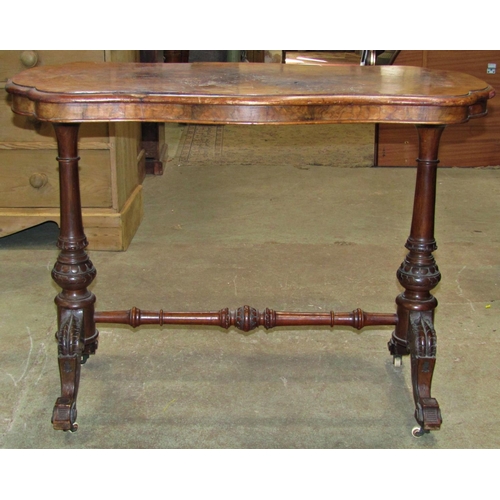 2264 - A Victorian walnut and figured walnut veneered occasional table with serpentine moulded outline, rai... 