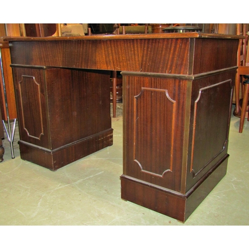 2279 - A reproduction Georgian style mahogany veneered kneehole twin pedestal writing desk with inset green... 